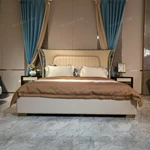 Cream Upholstered Bed with Decorative Accent Trim, Brand Emblem & Gold Stainless Steel Feet